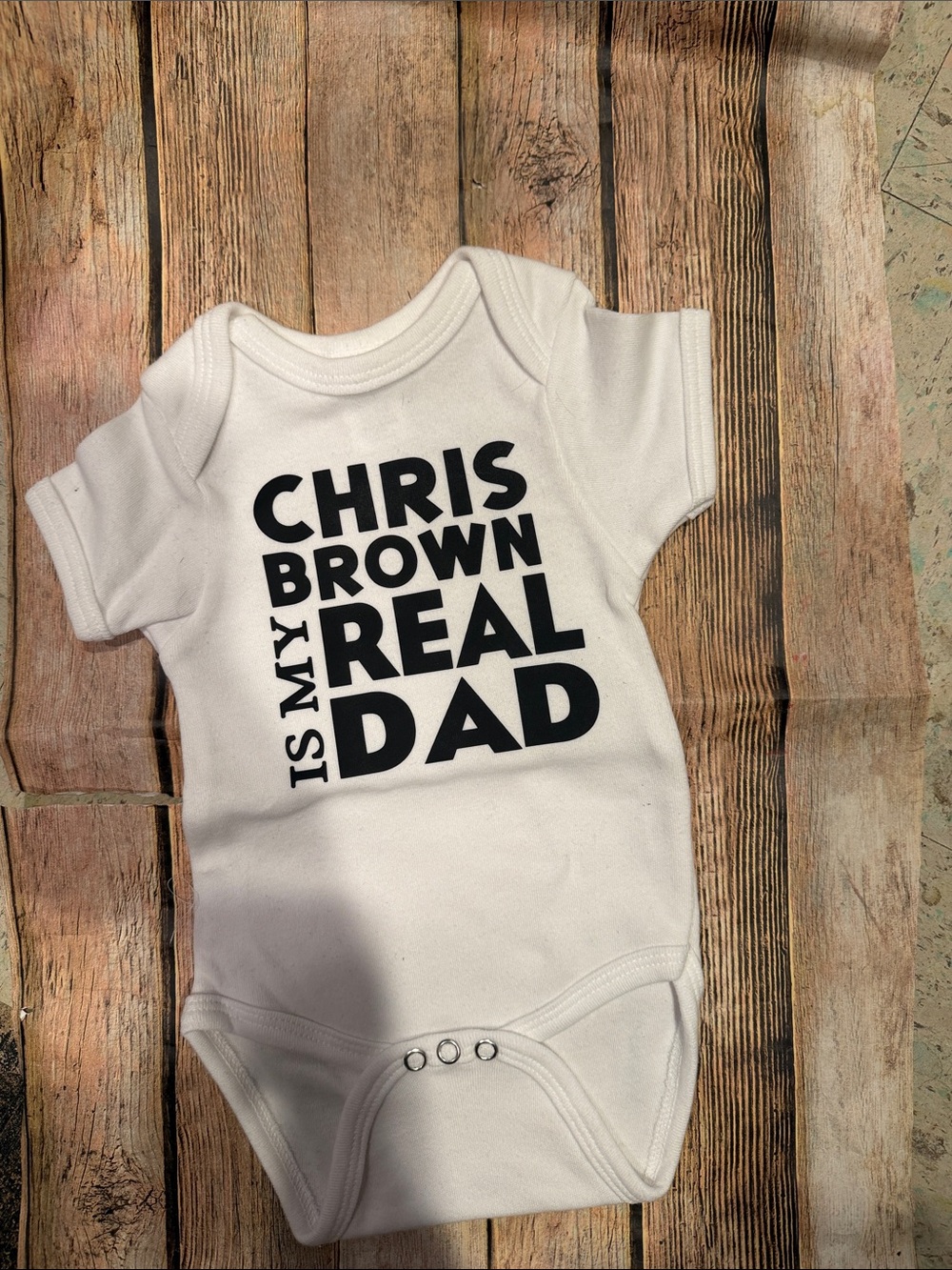 White Graphic Baby One-Piece Bodysuit - Bold Black Text